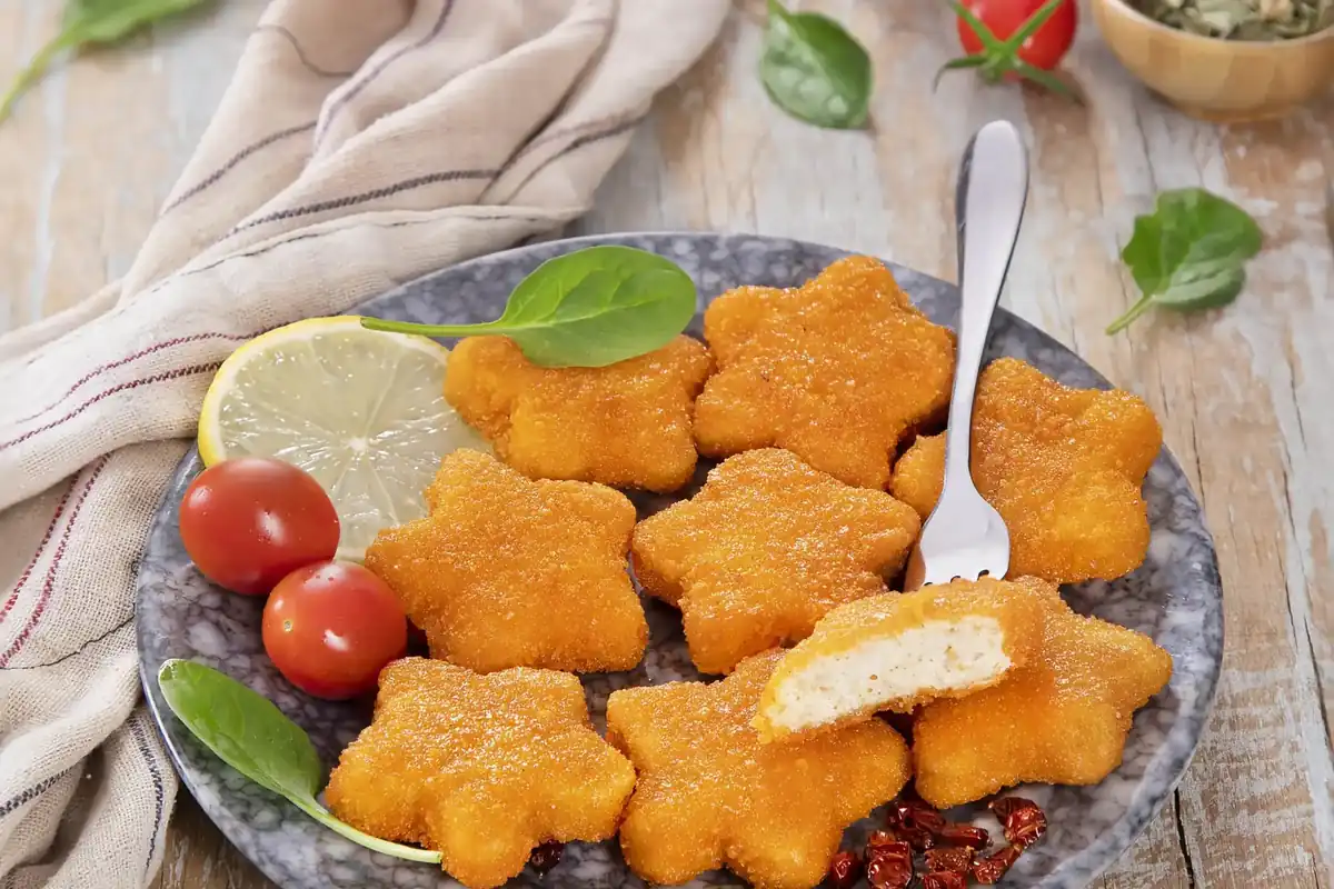 طرز تهیه “ناگت مرغ” لذیذ رستورانی در خانه+ مواد لازم دقیق و مراحل